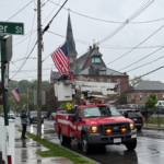 bucket truck installing flags