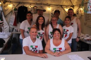 Staff at tshirt booth at SMC festival 2026